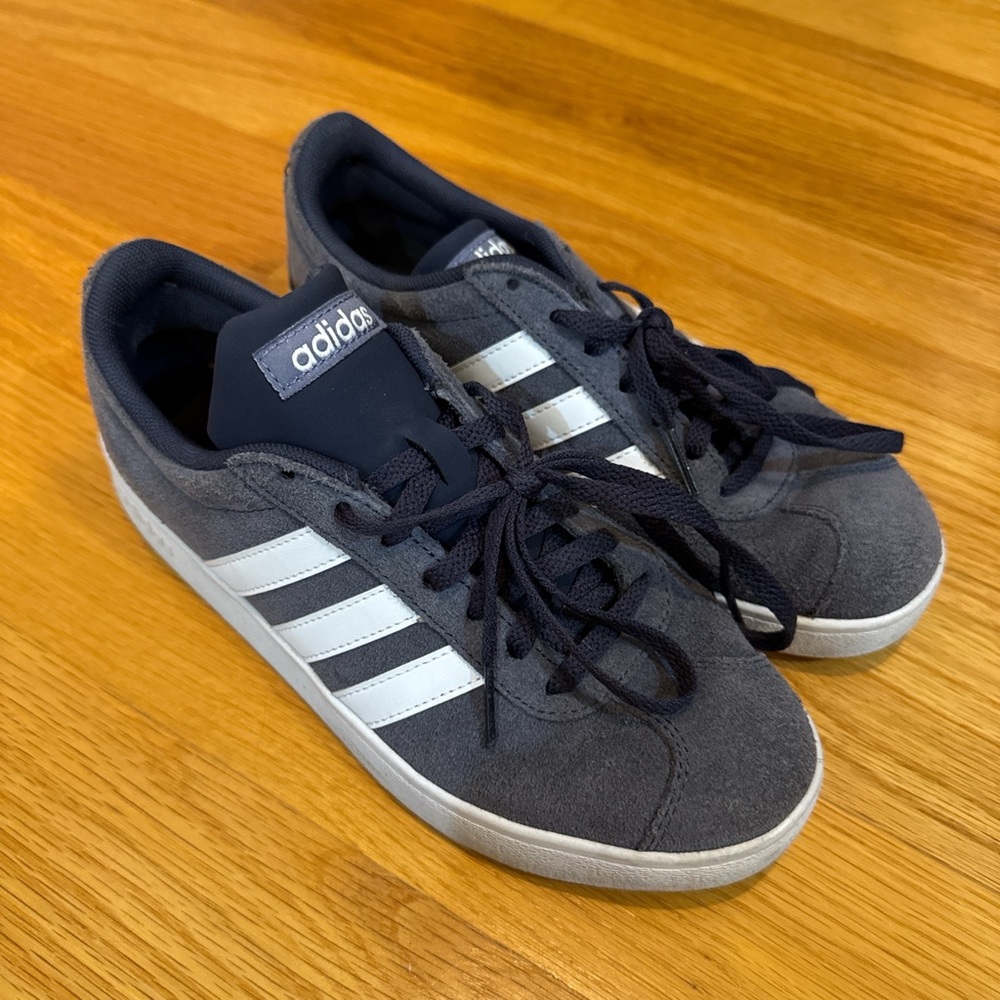 Navy and white primal adidas trainers